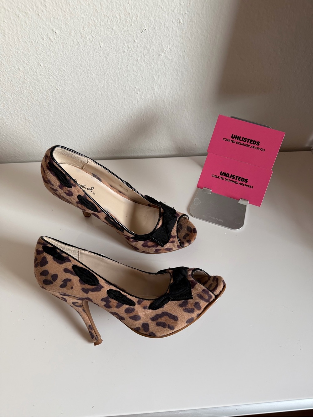 Leopard Print Peep-Toe Heels with Black Bow